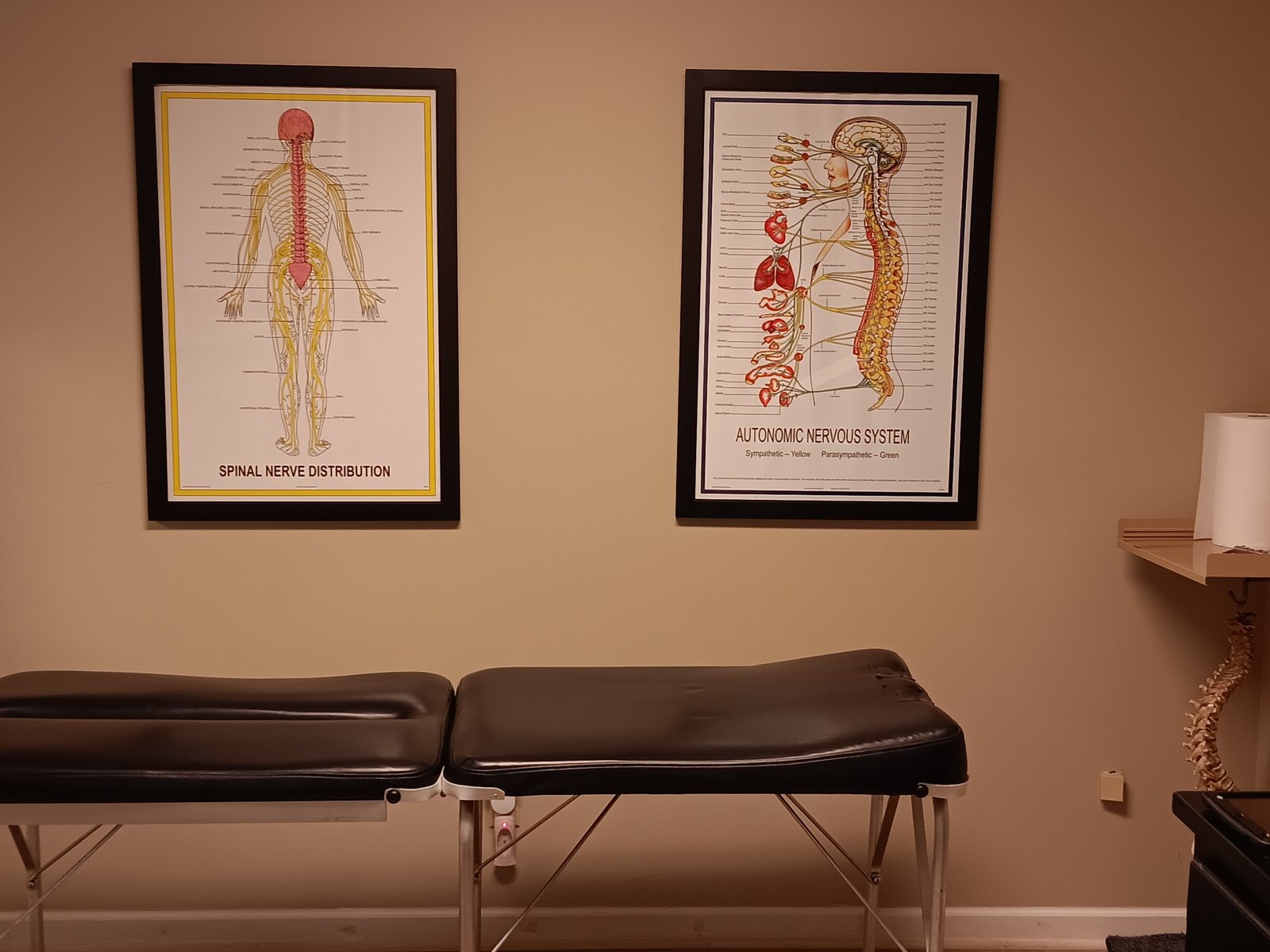 Treatment room with two chiropractic tables at Wellness Chiropractic Health Center